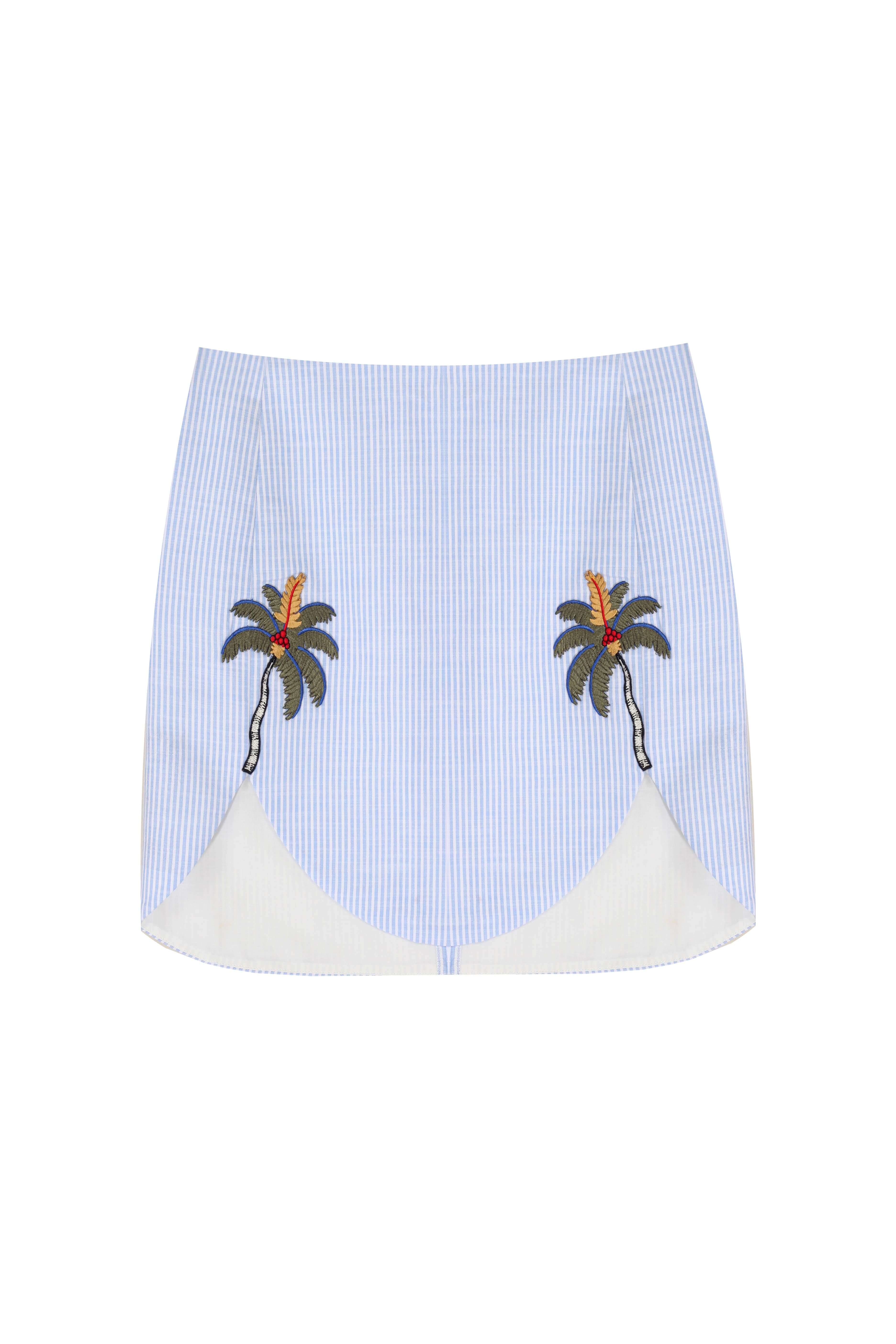 Kennedy skirt in blue linen with palm tree embroidery, sustainable materials, dry clean only.